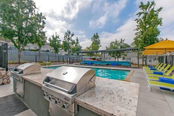 Outdoor kitchen with gas barbecues